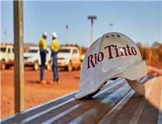 Rio Tinto halves dividend on 41% annual profit drop