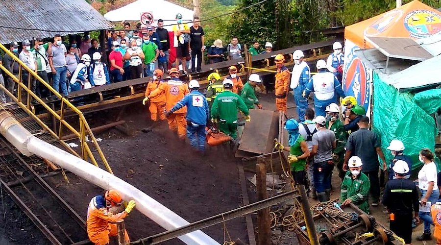 Explosion at Colombian coal mine kills nine workers, traps six
