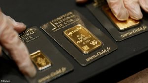 Gold prices pare losses after US inflation data